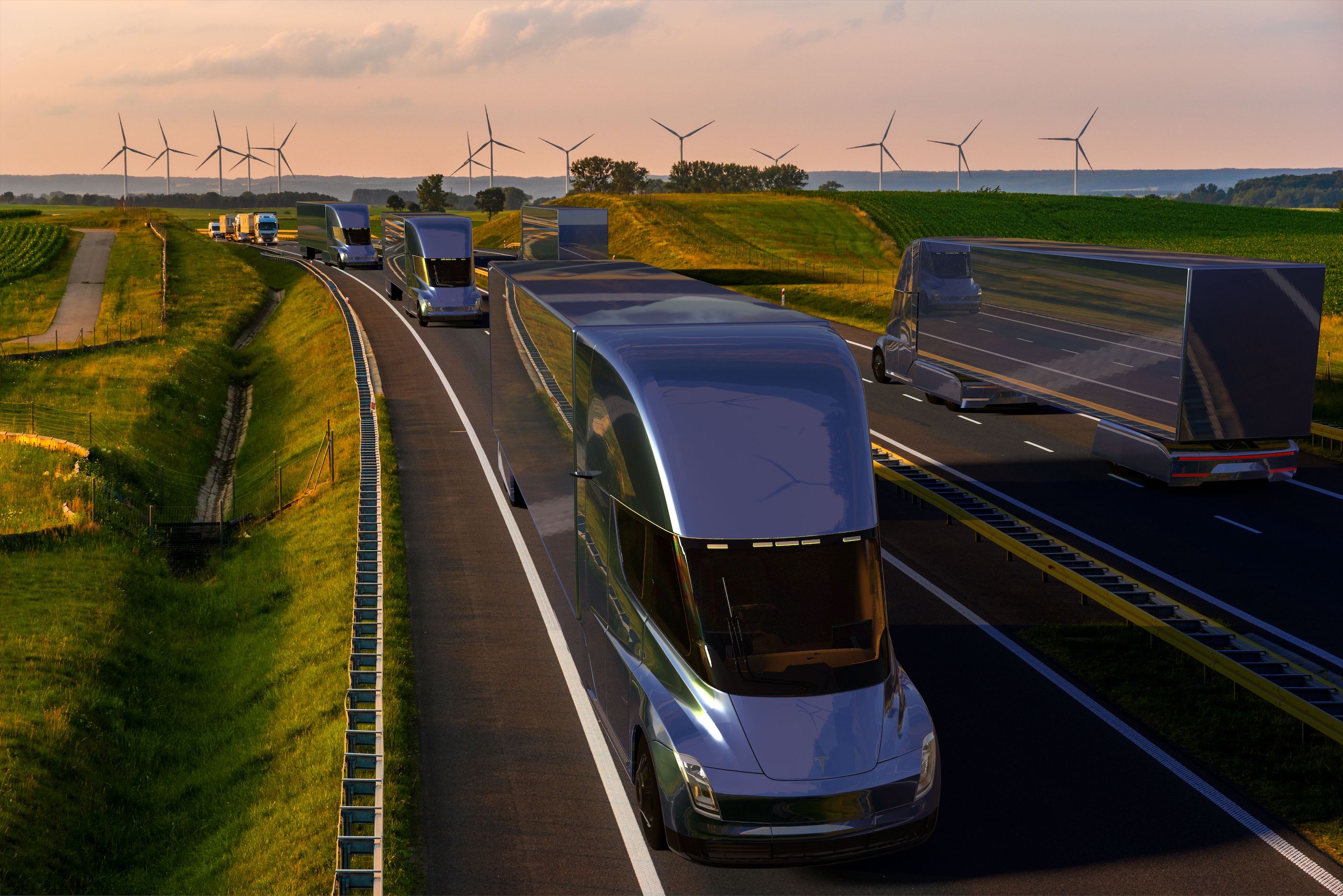 Artist's rendering of electric trucks on highway with wind turbines in background