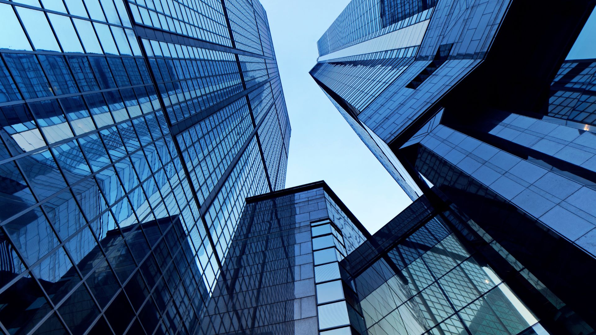 A low angle shot of skyscrapers towering above