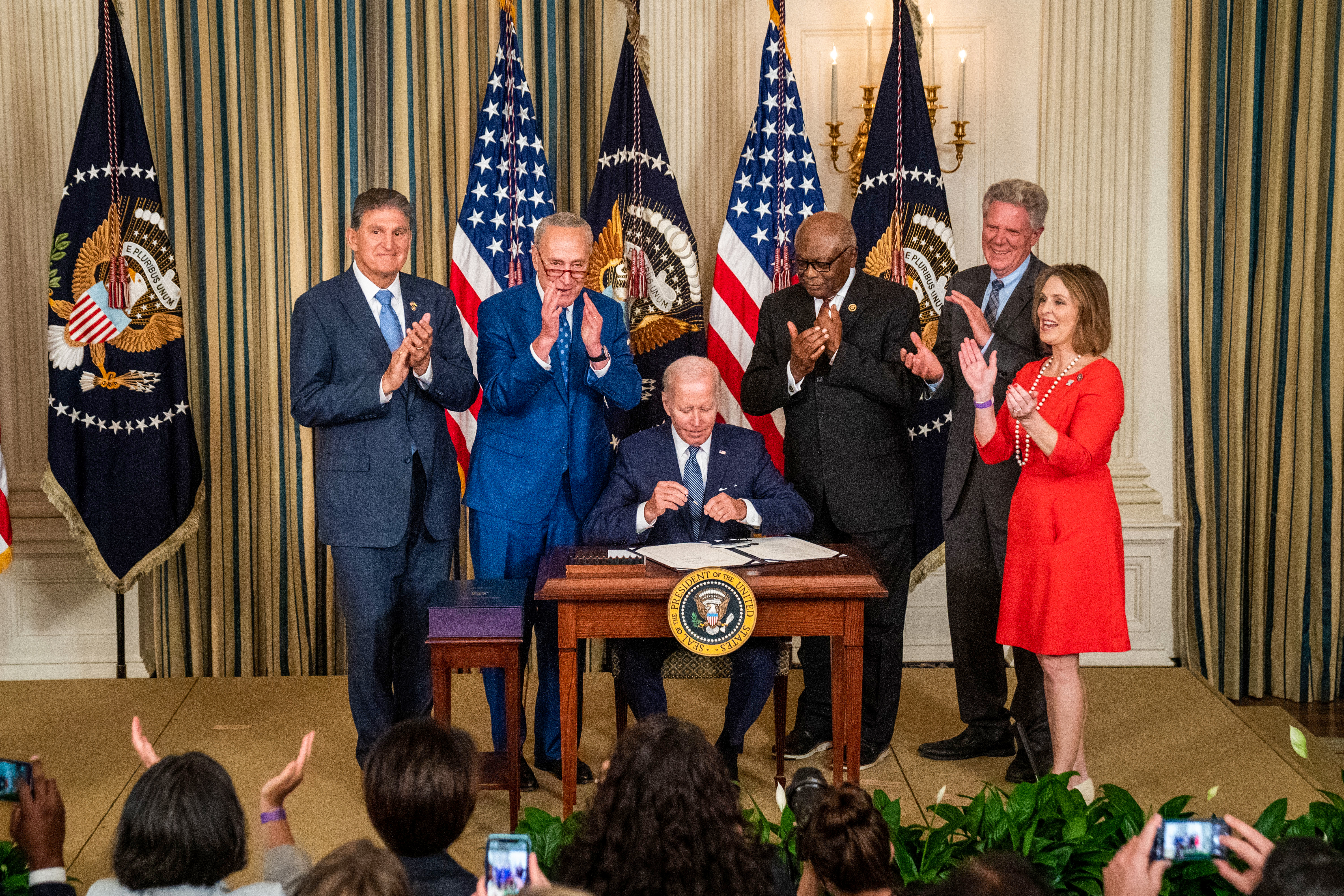 President Joe Biden signs the Inflation Reduction Act