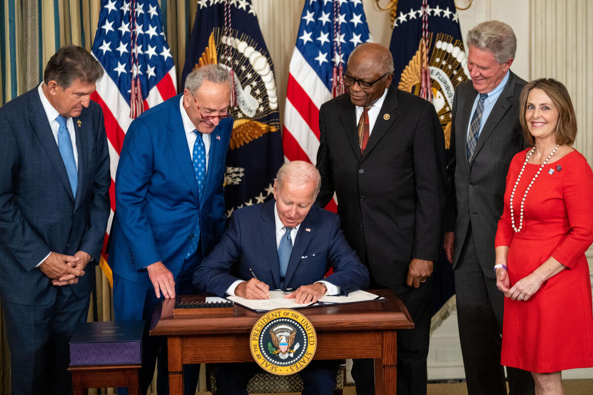 Joe Biden signing the Inflation Reduction Act