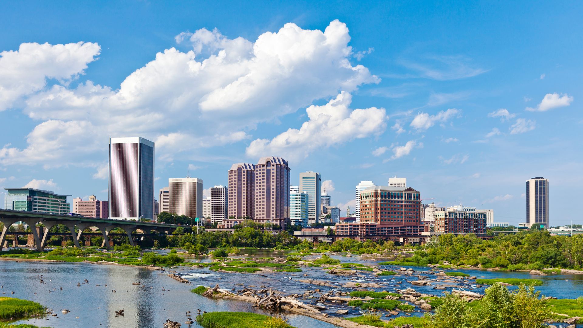 The Richmond, Virginia skyline under a blue sky