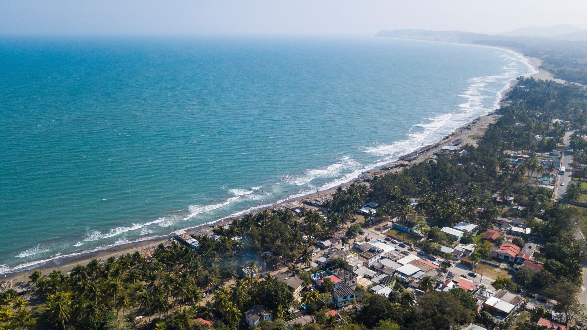 An overhead vista of a Gulf Coast beach which also feels like a pretty good vacation spot