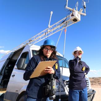 Two scientists monitoring methane leaks