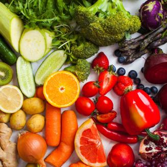 Colorful fruits and veggies are displayed