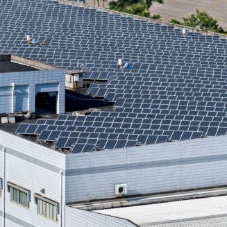 A solar panel array on top of a school building
