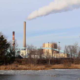 The J.H. Campbell coal plant in Michigan, as seen across a small body of water.