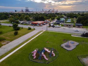 A playground near an oil and gas facility.