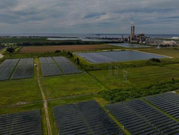 Field with solar panels on it