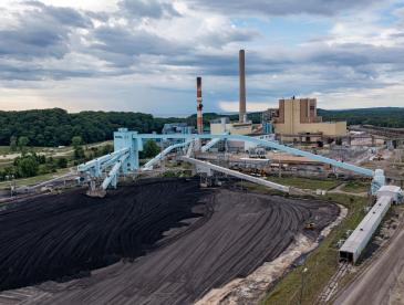 Piles of coal outside of a coal power plant